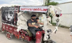 Suriyeli sanılmaktan korktu, motosikletine yazdı