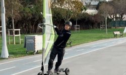 Deniz rüzgarıyla karada sörf yaptı