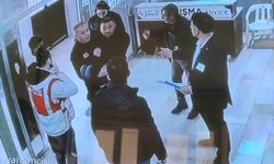 Sınava giderken aracının lastiği patlayan engelli genci polis, kucağında taşıdı