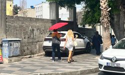 Mersinlilerin sıcakla imtihanına şemsiye kalkanı