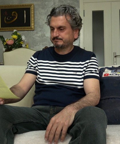 Tuttuğu devasa balıkla sevinç yaşayan öğretmenin mutluluğu yazılan cezayla yarıda kaldı