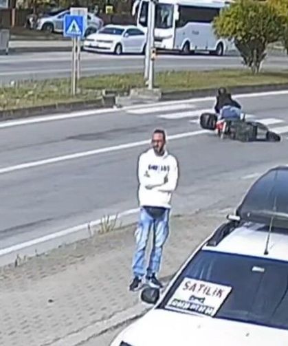 Kırmızı ışığı son anda fark etti, motosikletten düştü