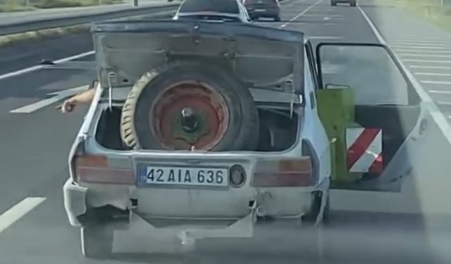 Bagaj ve kapısı açık seyreden sürücünün ehliyetine el konuldu