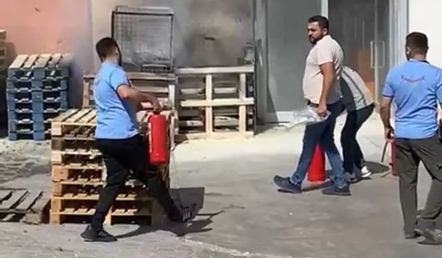 Yangın tüpünü alan koştu