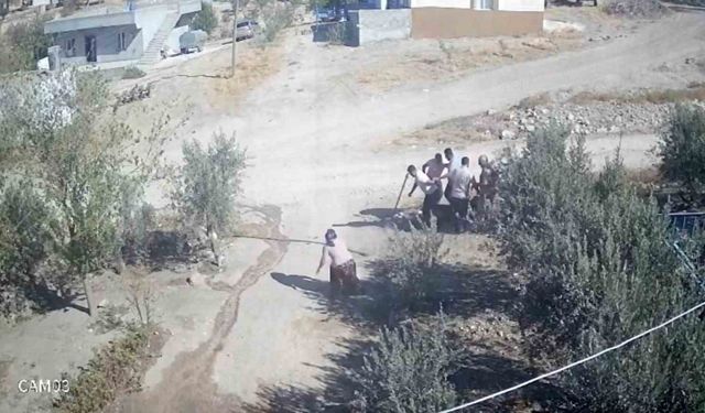 Kafası taşla ezilmek istenen baygın kocasını saldırganlara taş atarak kurtardı