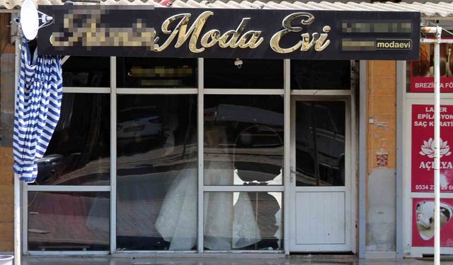Boşanmak isteyen eşinin gelinlikçi dükkanını benzin dökerek ateşe verdi