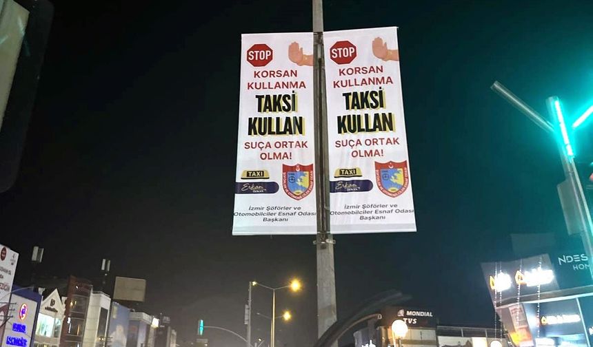 İzmirli taksiciler şehir geneline "korsan kullanma" afişleri astı