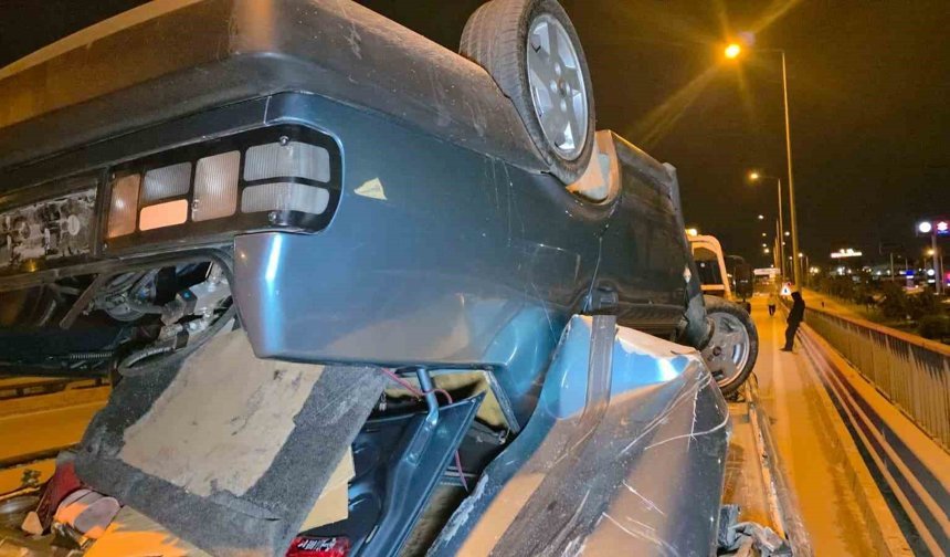 Takla atan otomobilden burunları bile kanamadan çıktılar